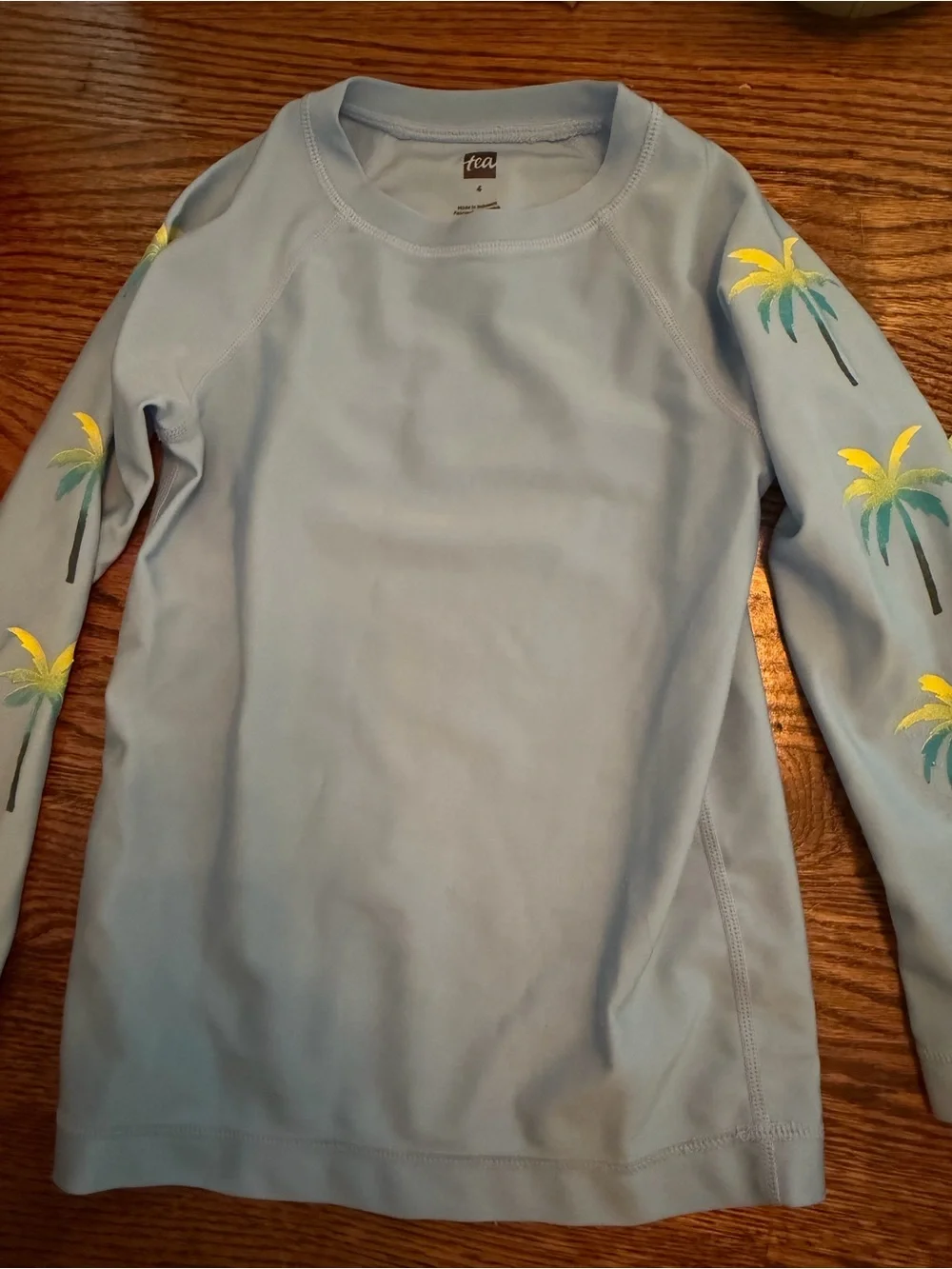 4T - Tea Collection Light Blue Rashguard Top with Tropical Palm Print